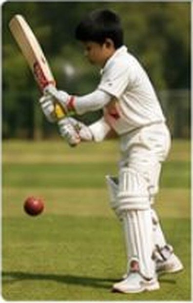 Young player batting at L1 foundation level